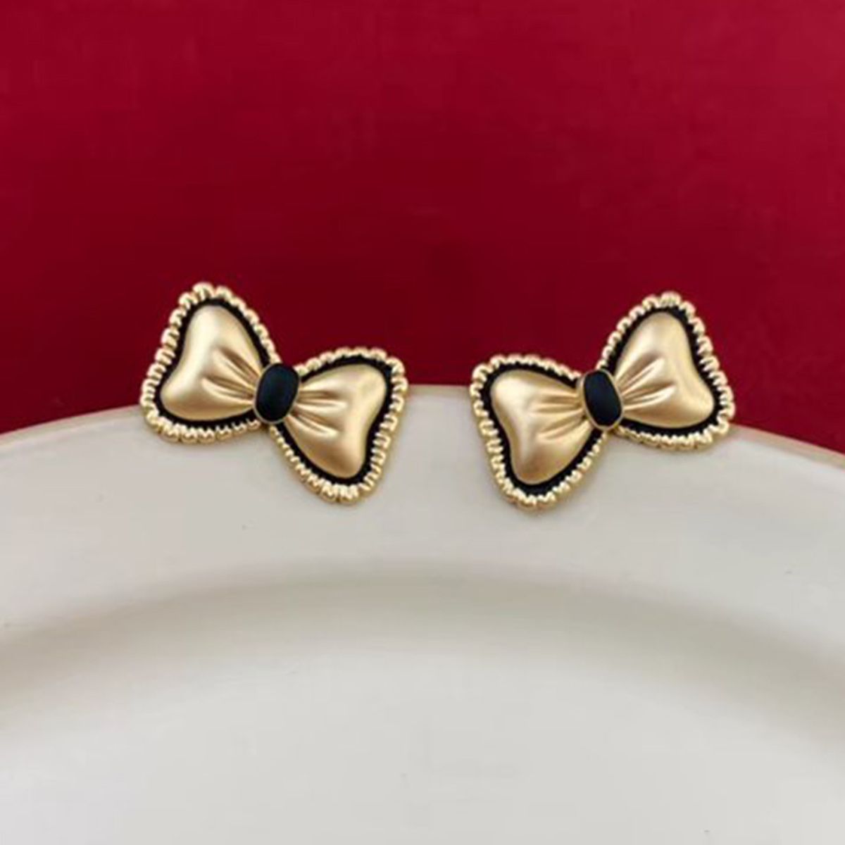 1 paio di orecchini a bottone in lega con nodo a fiocco stile semplice IG_voghion.com