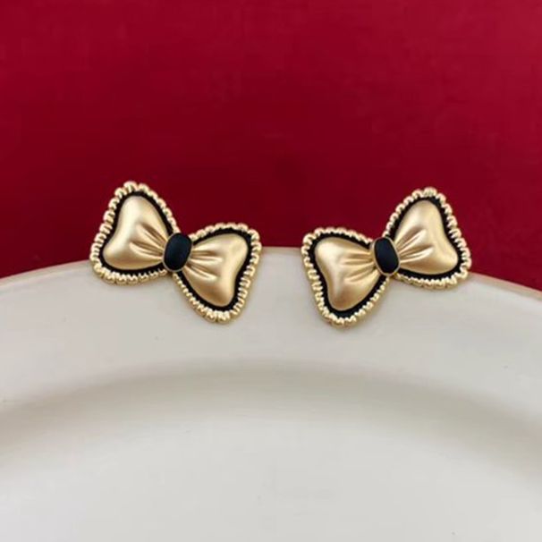 1 paio di orecchini a bottone in lega con nodo a fiocco stile semplice IG_voghion.com