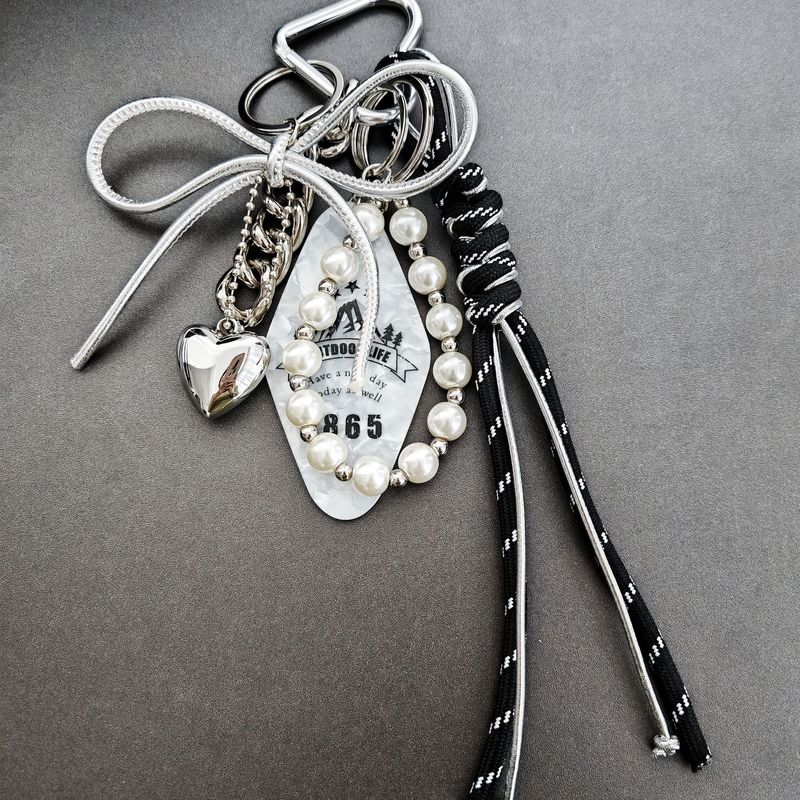 Taschenanhänger Metallic High-End Silber Schleife Taschenanhänger, Geflochtene Schnur Perle Schlüsselanhänger_voghion.com