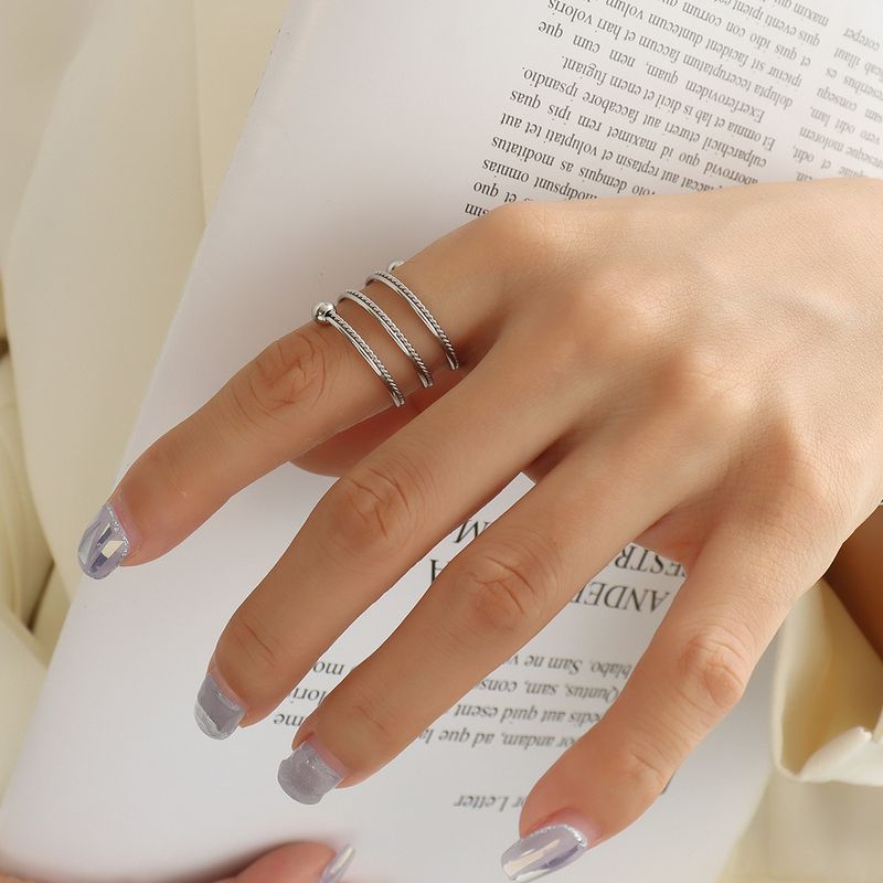 Niche Double-layer Ring Spring Twist Rotating Ring Variable Finger Circumference Titanium Steel Jewelry_voghion.com
