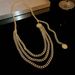 Exquisite and trendy multi-layer adjustable waist chain, gold fashionable and textured sweater chain, women's high-end and personalized accessories_voghion.com