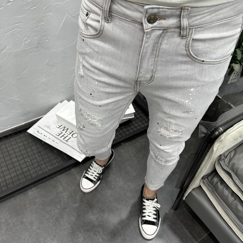 Vêtements pour hommes : jean gris clair déchiré et élégant, coupe slim élastique, neuf points, tendance, tendance._voghion.com