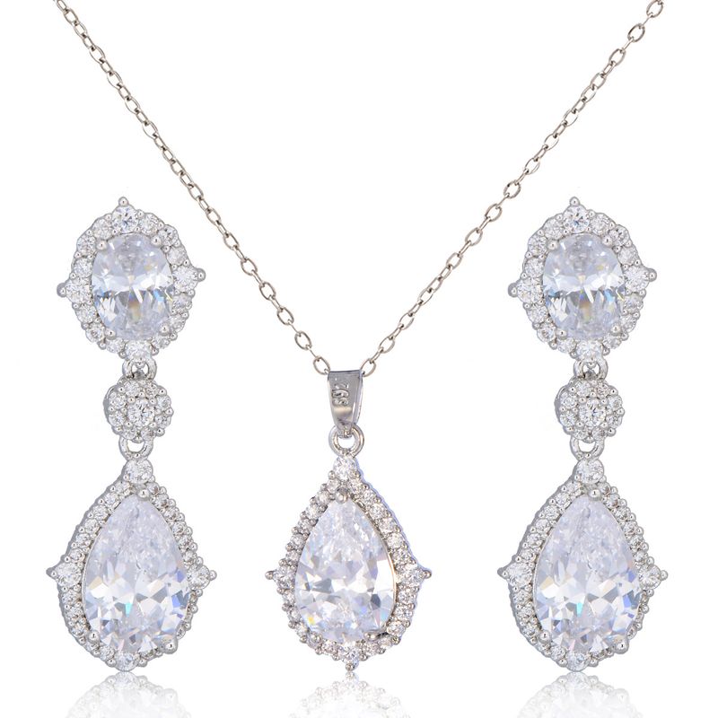 Set di gioielli con intarsi in ottone e gocce d'acqua in zircone_voghion.com