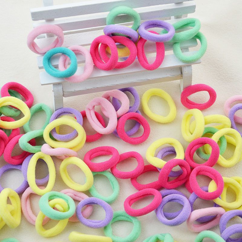 Barntillbehör Engångshår för flickor Liten hårring Gummiband Hög elastisk godisfärgad liten sömlös handduksring Hårring_voghion.com