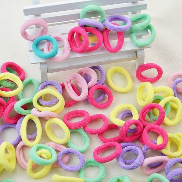 Barntillbehör Engångshår för flickor Liten hårring Gummiband Hög elastisk godisfärgad liten sömlös handduksring Hårring_voghion.com
