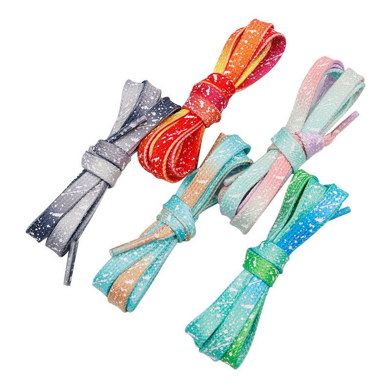 Lacci per scarpe piatti con inchiostro fluorescente a spruzzo e sfumatura luminosa_voghion.com