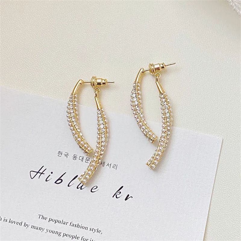 Ελαφριά πολυτελής niche υψηλής ποιότητας σταυρός ψαροκόκαλο μαργαριτάρι για γυναίκες 2024 νέα ιδιοσυγκρασία Διαδίκτυο διάσημα σκουλαρίκια_voghion.com