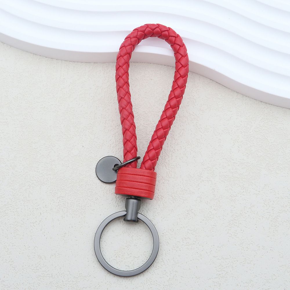 Portachiavi in pelle intrecciata con targhetta in metallo per auto_voghion.com