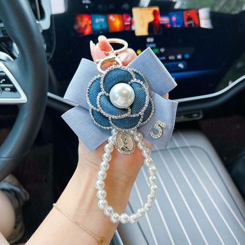 Internet celebrity personality denim butterfly bow camellia pearl chain keychain car key bag women's small pendant_voghion.com