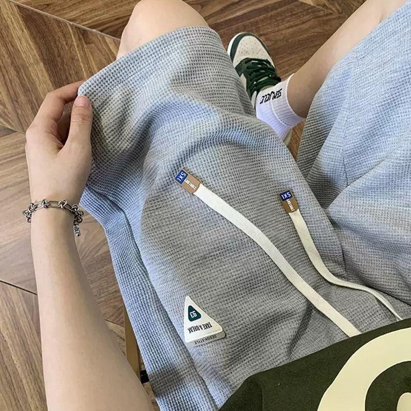 Abbigliamento maschile Pantaloncini a nido d'ape casual ad asciugatura rapida da uomo estivi larghi da uomo taglie grandi dritti grassi alla moda pantaloni a cinque punte pantaloni sportivi_voghion.com