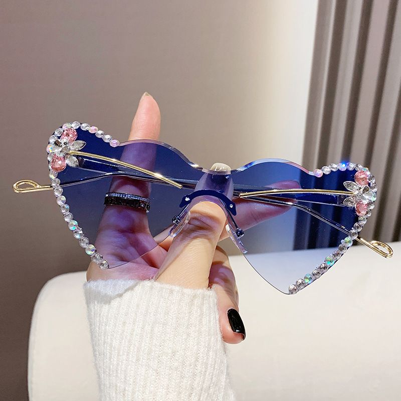 Love one-piece rimless diamond cat-eye sunglasses Fashion women's sunglasses peach heart women men_voghion.com