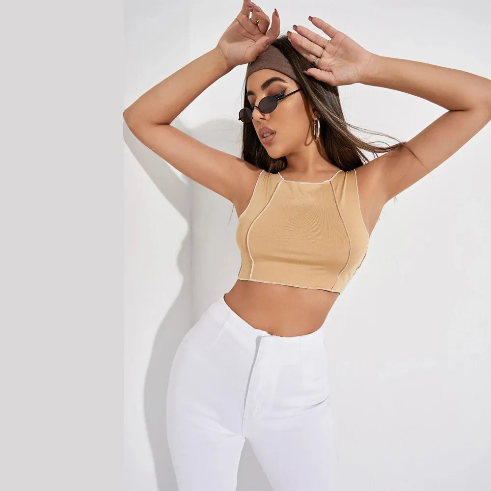 2023 printemps/été nouveau bas suspendu débardeur Sexy et polyvalent couleur unie coupe ajustée épicé fille ouvert Umbilium haut_voghion.com