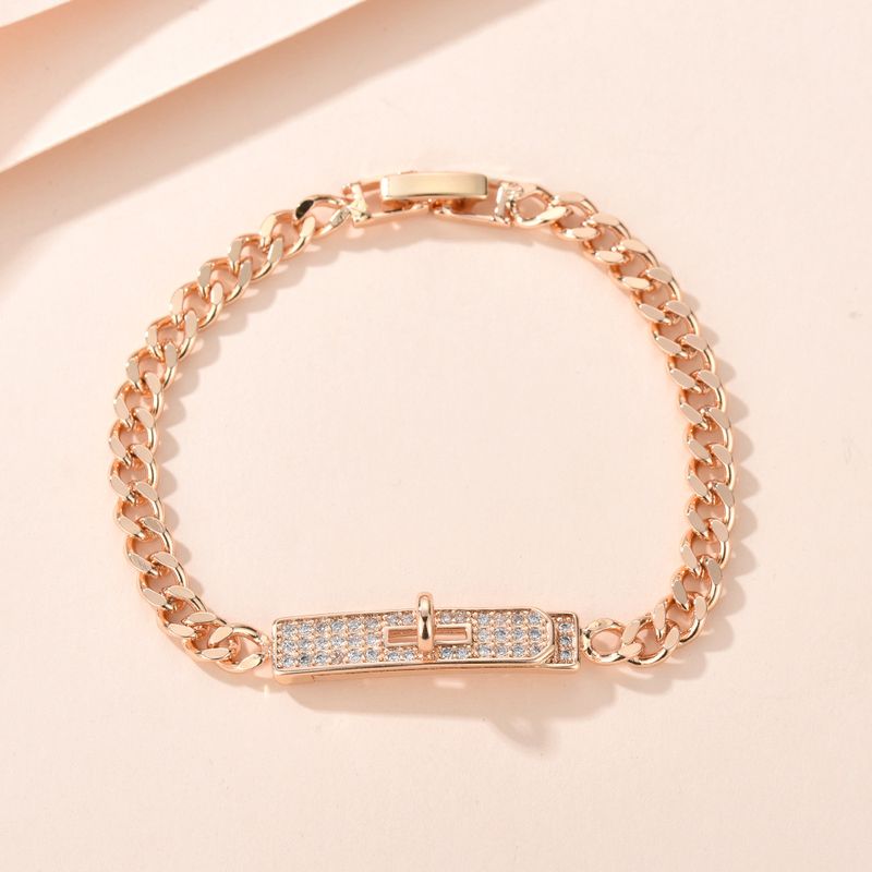 Braccialetto di rame semplice, versatile, alla moda, in oro champagne, con catena cubana leggera e di lusso, con bottoni pieni di diamanti._voghion.com