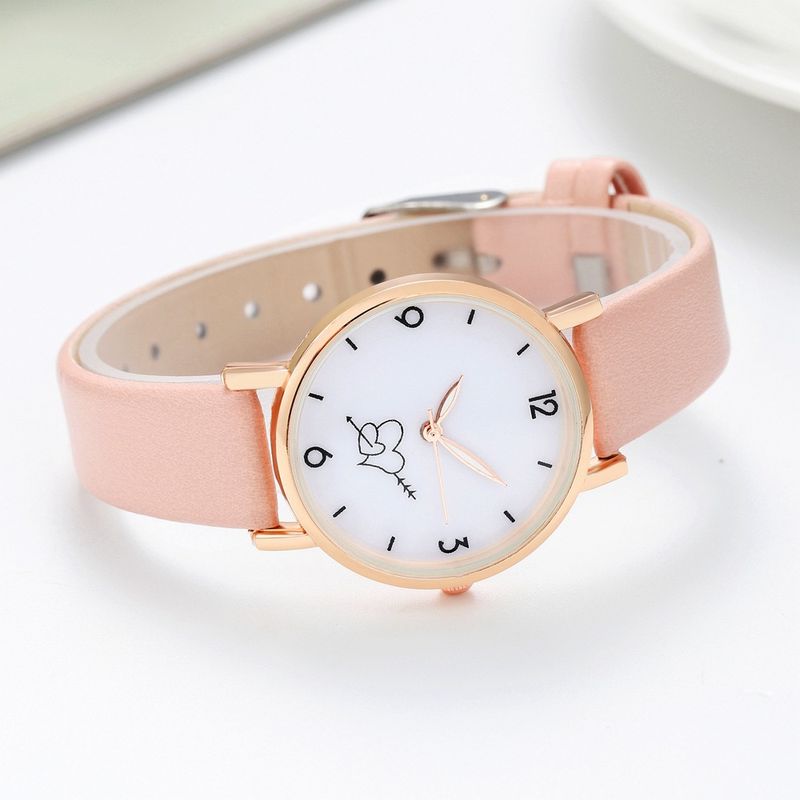 Nuevo y lindo reloj de estudiante con forma de corazón y una flecha perforada, popular entre las internautas femeninas, muy vendido con productos, simple y_voghion.com