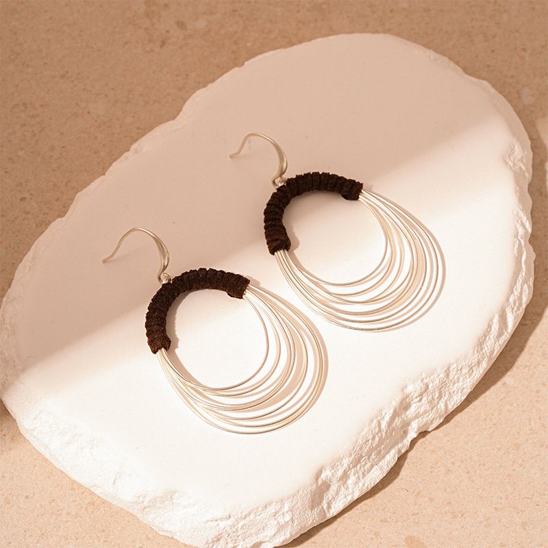 Orecchini geometrici in tessuto avvolgente personalizzati con gancio per l'orecchio a più strati esagerati_voghion.com