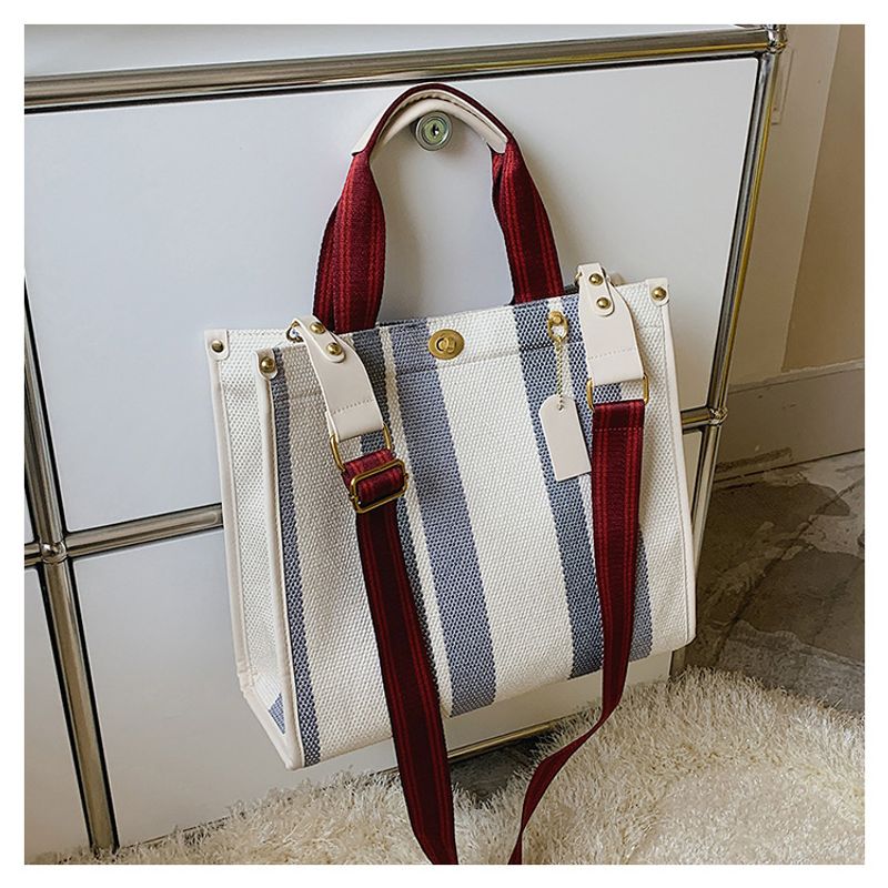 Borsa femminile 2024 nuova borsa tote portatile retrò europea e americana trendy zaino a tracolla per studenti in tela a righe_voghion.com