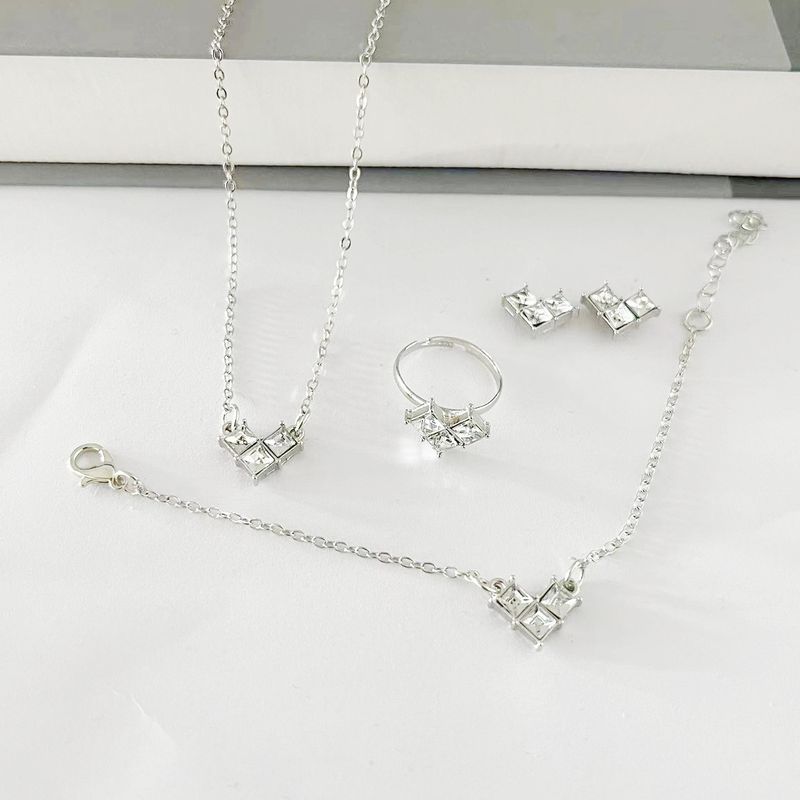 Ensemble de colliers et boucles d'oreilles en alliage exquis à la mode, accessoires incrustés, ensemble de quatre pièces_voghion.com