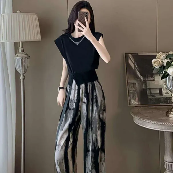 Completo due pezzi da donna in stile europeo casual di alta qualità, con pantaloni larghi e maniche corte neri, snellenti ed estivi_voghion.com