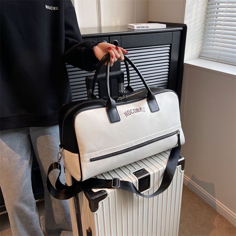 Nuevo bolso de viaje de corta distancia para mujer, sencillo, versátil, de un solo hombro, bandolera, bolso de mano para fitness, bolso de almacenamiento para hombres, bolso de embarque, venta al por mayor_voghion.com