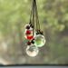 Colgante de cristal para interior de coche, pequeño y fresco, con forma de botella de perfume artística._voghion.com