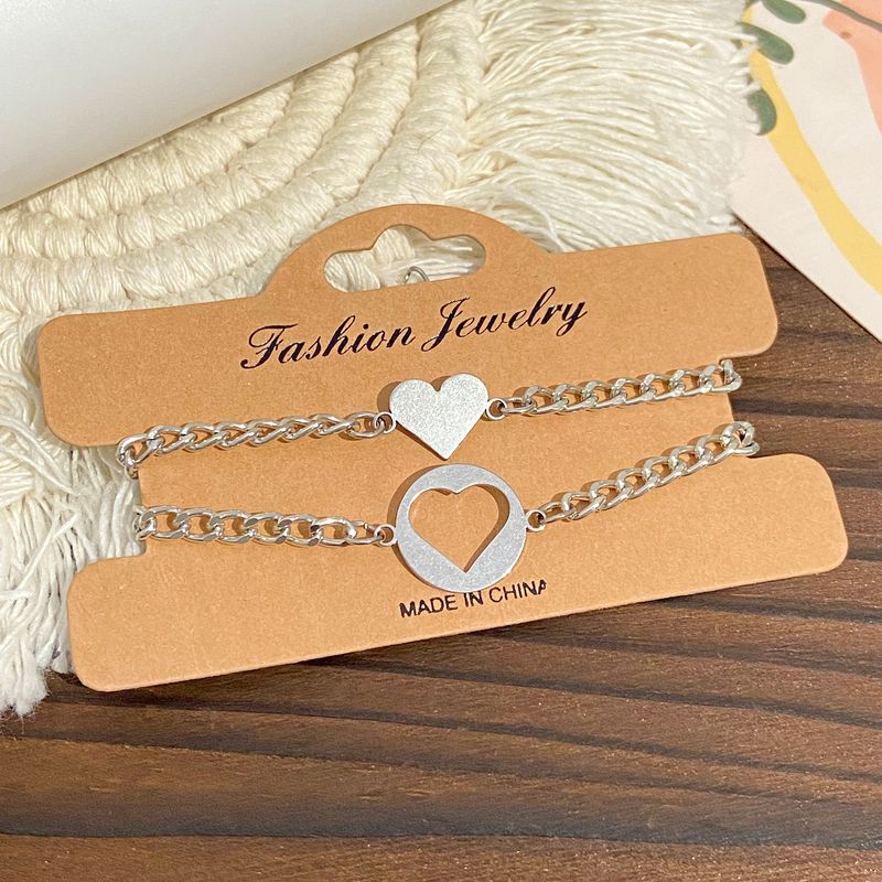 Lot de 2 bracelets de couple en acier inoxydable gravables, motif cœur creux, soleil et lune, en titane_voghion.com