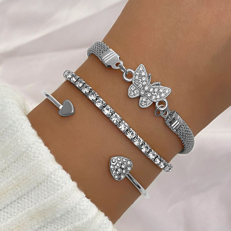 Nuovo set di braccialetti portafortuna di lusso con luce creativa, design aperto, cuore a farfalla e diamanti_voghion.com