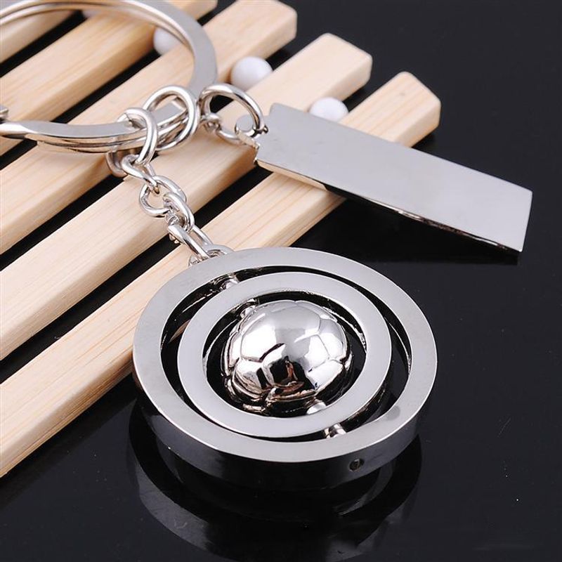 Porte-clés de football créatif rotatif en métal avec pendentif en forme d'étiquette de football_voghion.com
