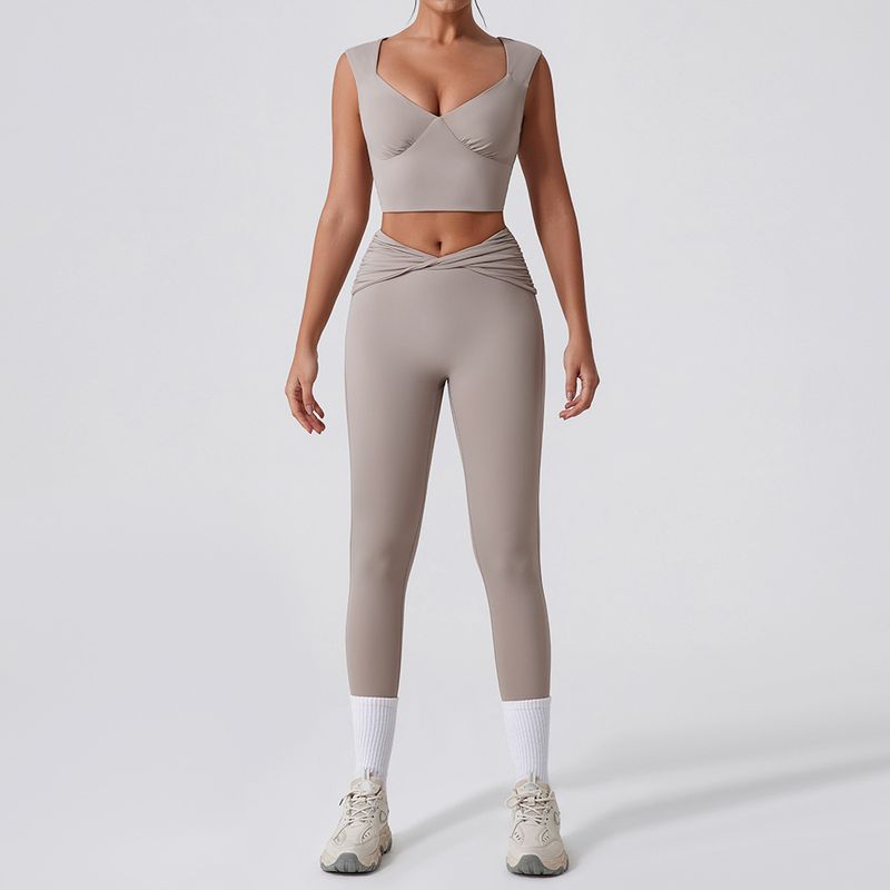 European And American New Tight Vest Yoga Suit Quick Drying Twist High Waist Flared Casual Versatile Fitness Sports Suit_voghion.com