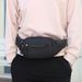 Riñonera de gran capacidad con múltiples bolsillos y cremallera suave, color negro, impermeable, para viajes y compras._voghion.com