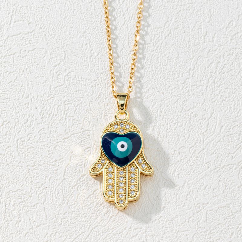 Fashion trend new copper zircon devil's eye palm necklace pendant micro plated gold sweater chain_voghion.com