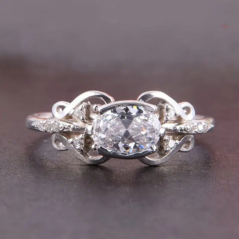 Cao Shi Welfare Zircone Oggetti di scena per matrimoni Anello femminile ovale micro intarsiato in pizzo alla moda e squisito_voghion.com