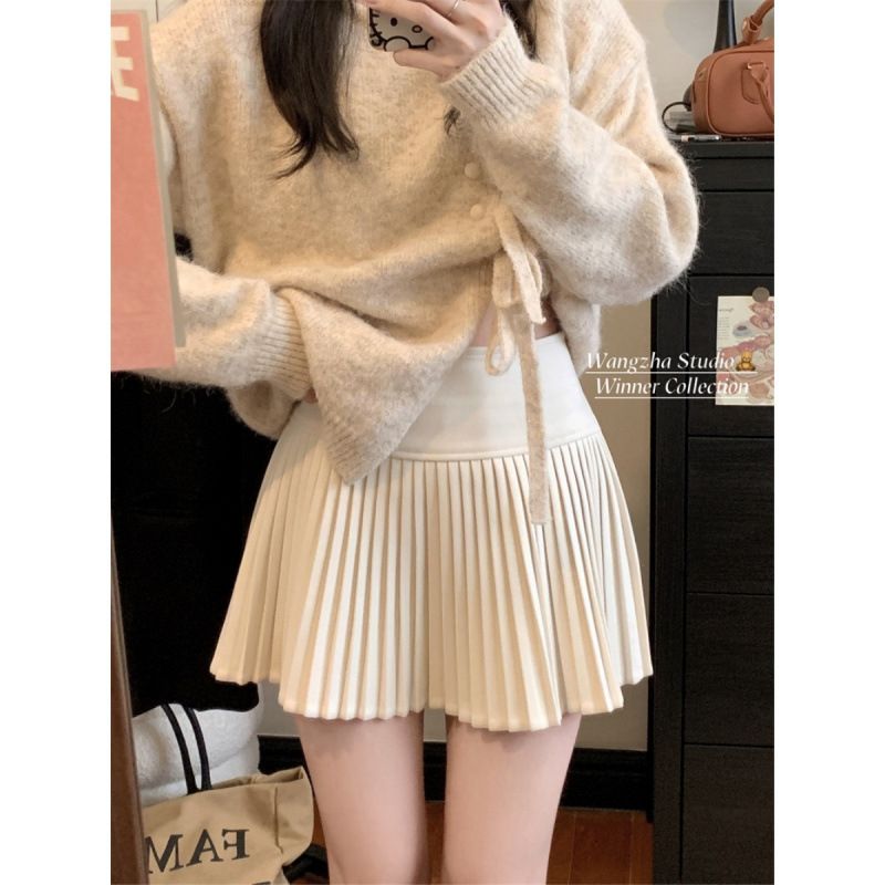 2024 Autumn/Winter New Fashion Irregular Strap Apricot Sweater Coat High Waist pleated Skirt Two Piece Set_voghion.com