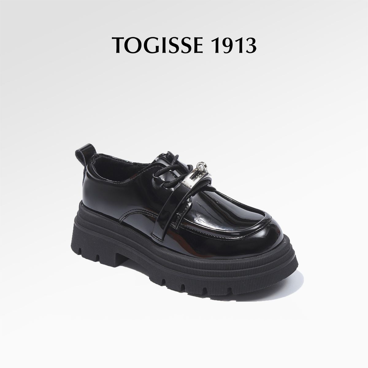 Mocassini singoli stringati in stile inglese, in vera pelle, con tacco spesso e profilo basso_voghion.com