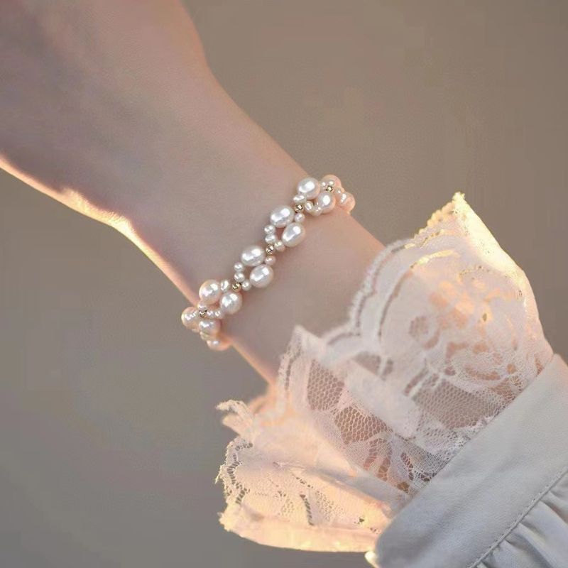 Bracciale in pizzo di perle d'acqua dolce in stile francese, placcato oro americano, leggero, lussuoso, regalo di alta gamma, design di nicchia, atmosfera femminile_voghion.com