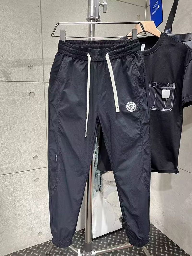 Men's Clothing New Quick drying Skinny Pants Light Luxury Labeled Sports Pants Youth All match Casual Pants Nine point Pants Men_voghion.com