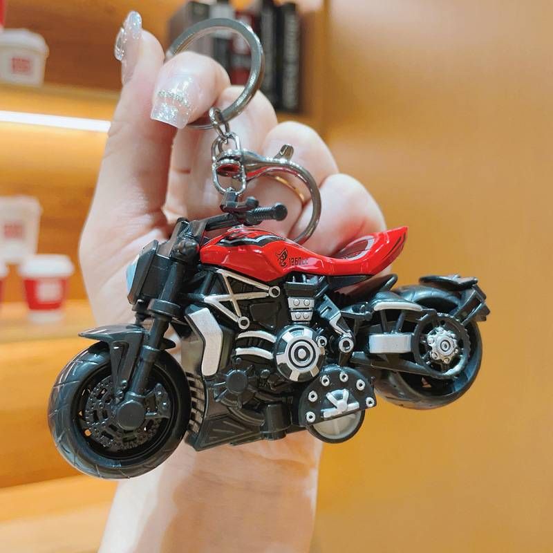 Luova uusi Advantage moottoripyörän avaimenperä Hieno auton avaimenperä laukku riipus Claw Machine pieni lahja sarjakuva kilpa-auto_voghion.com