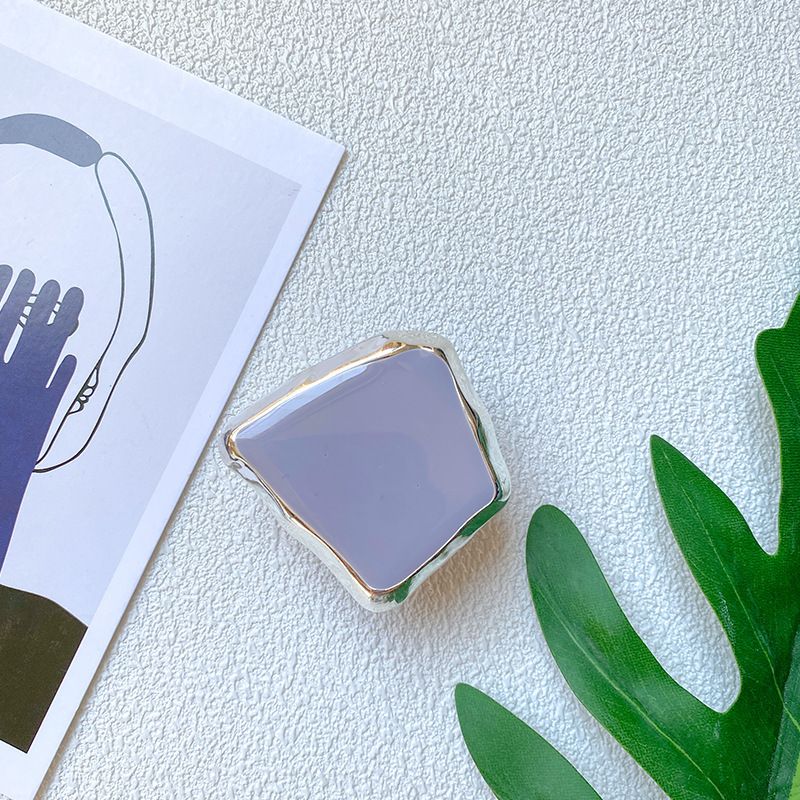 Supporto creativo per airbag per telefono cellulare, blocchi di metallo elettroplaccati per un tocco minimalista e di alta qualità, con un meccanismo retrattile_voghion.com