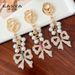 Handmade Series Pearl String Bow Shape Keychain Pendant Metal Diamond Bag Pendant Gift_voghion.com