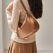 2025 Neue Frühjahrs- und Sommer-Hundert-High-End-Feeling-Knödeltasche Crossbody-Leder-Damen-Umhängetasche_voghion.com