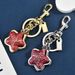 Portachiavi con stella a cinque punte con sovrapposizione avanzata, accessorio per borsa da donna, squisito ciondolo ornamentale_voghion.com