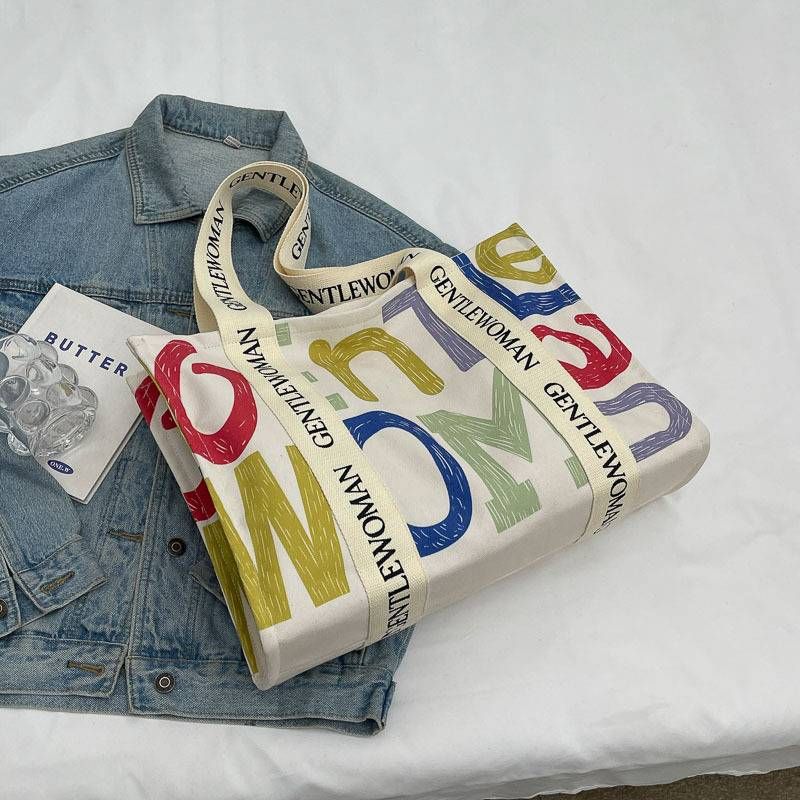 Mode Leinwand Tasche Frauen Buchstaben Quaste Schulter Tasche Frauen Denim Material große Kapazität Einkaufstasche Frauen_voghion.com