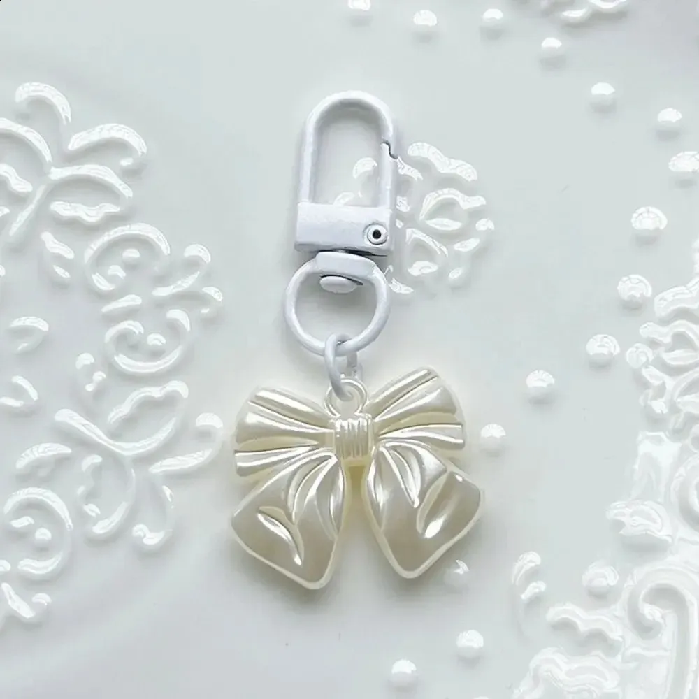 Semplice fiocco di perle in acrilico, piccolo regalo da appendere, ciondolo per borsa, zaino, portachiavi, donna e ragazza 250224_voghion.com