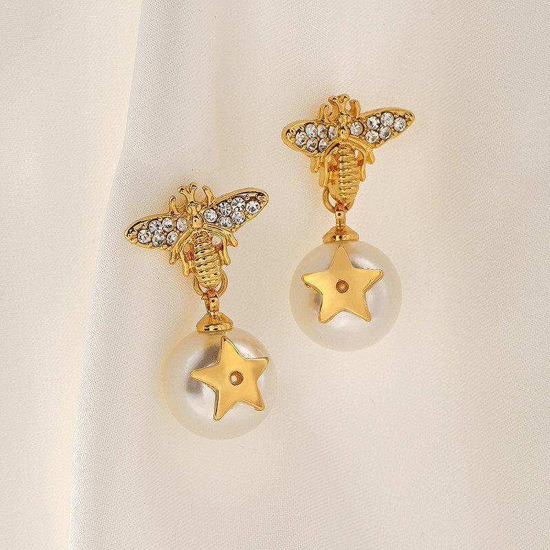 Orecchini squisiti alla moda con pietre preziose incastonate in argento con perle e aghi a forma di stella di Qingdao Jewelry_voghion.com