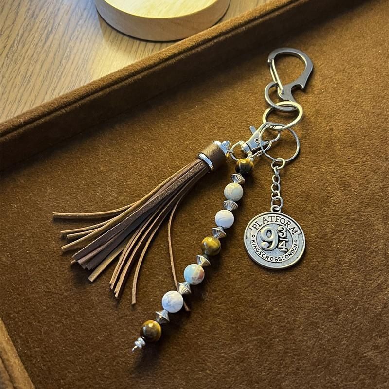 Porte-clés élégant à pompon perlé - Accessoire de sac bohème vintage fait main avec perles en bois_voghion.com