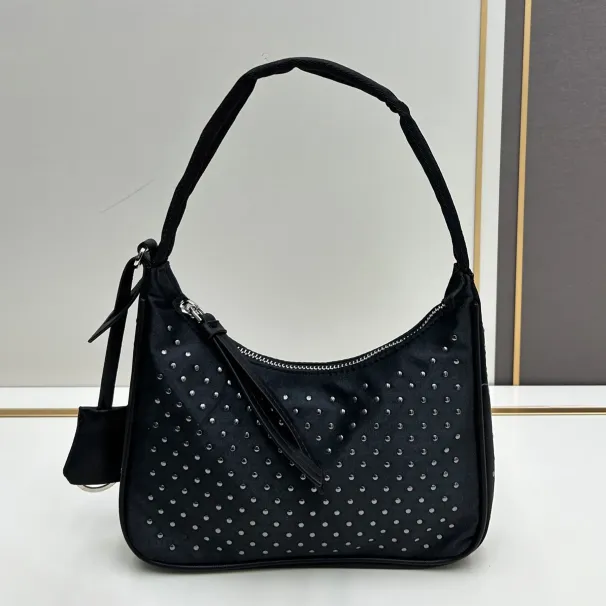 Nuova mini borsa in nylon con borchie, chiusura a cerniera, tracolla con manico in nastro intrecciato, moda donna_voghion.com