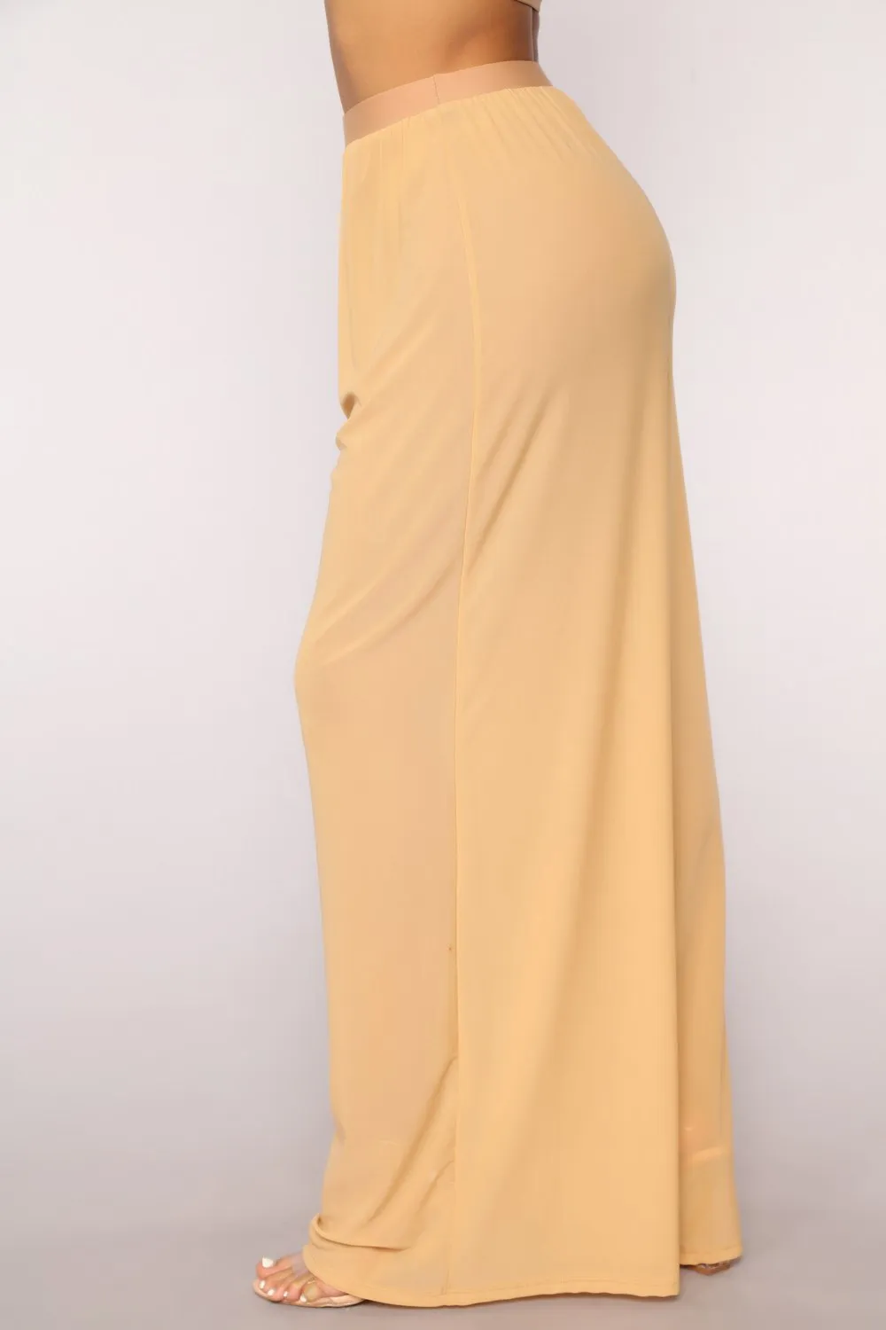 Sieviešu seksīgas, caurspīdīgas, platas bikses no tīras krāsas sieta auduma._voghion.com