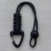 Outdoor Camping Multifunctional Hanging Bucle Triangle Wrist Adjustable Elastic Rope Chain Seven-Core Anti-Lost EDC_voghion.com