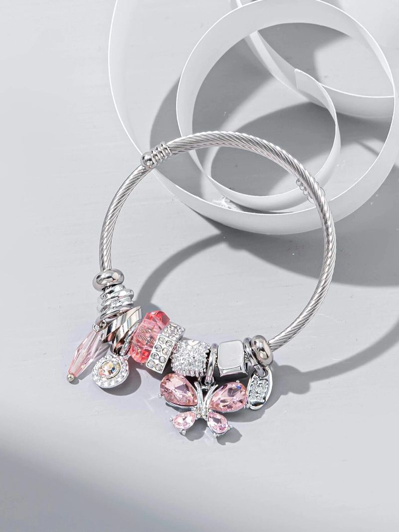 Nuovo braccialetto coreano in acciaio inossidabile con perline di vetro e nappa di cristallo a farfalla aperta, pezzo da donna_voghion.com