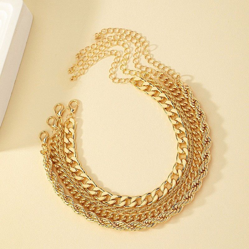 Nuovo set di 4 pezzi in metallo con bracciale a catena cubana intrecciata a strati_voghion.com