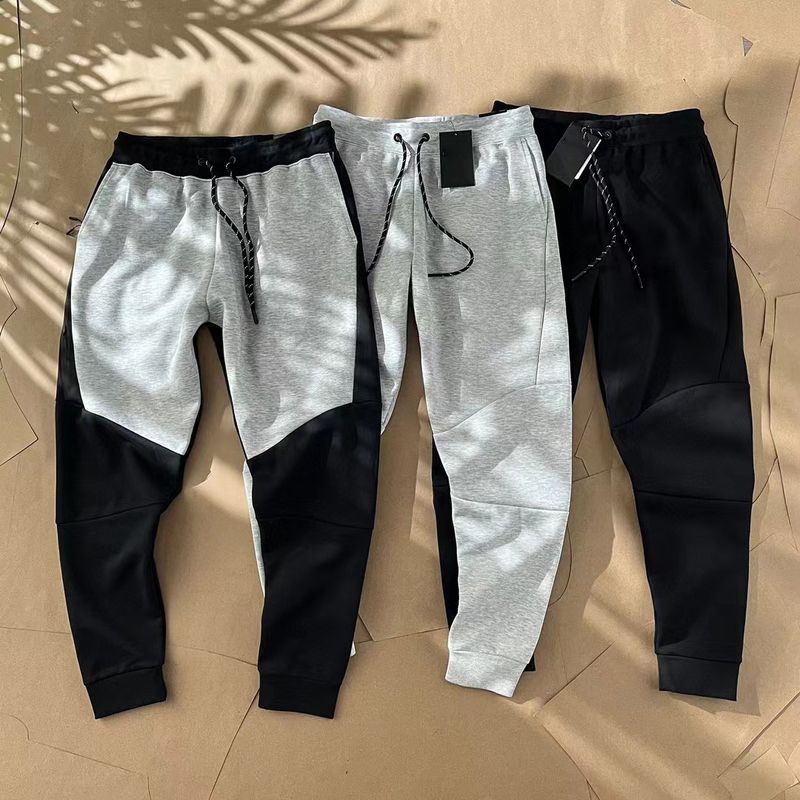 Men's overseas version diagonal zipper pressed rubber tapered sanitary long pants_voghion.com